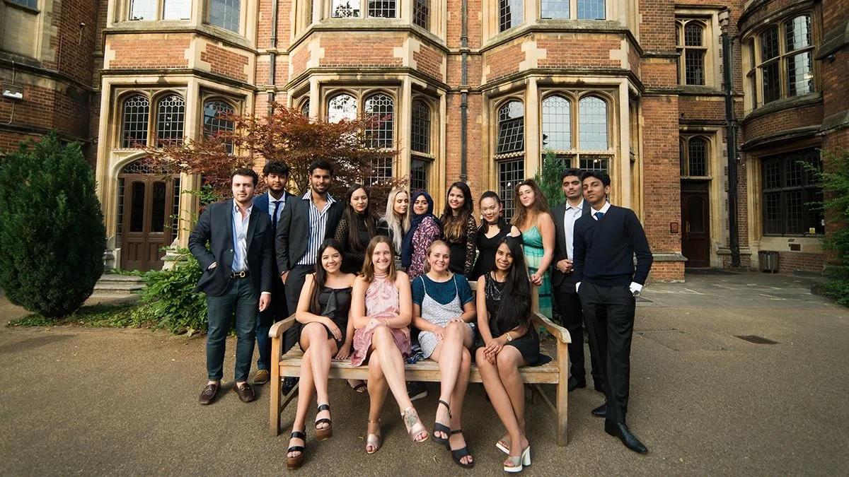 Students outside oxford college on graduation day